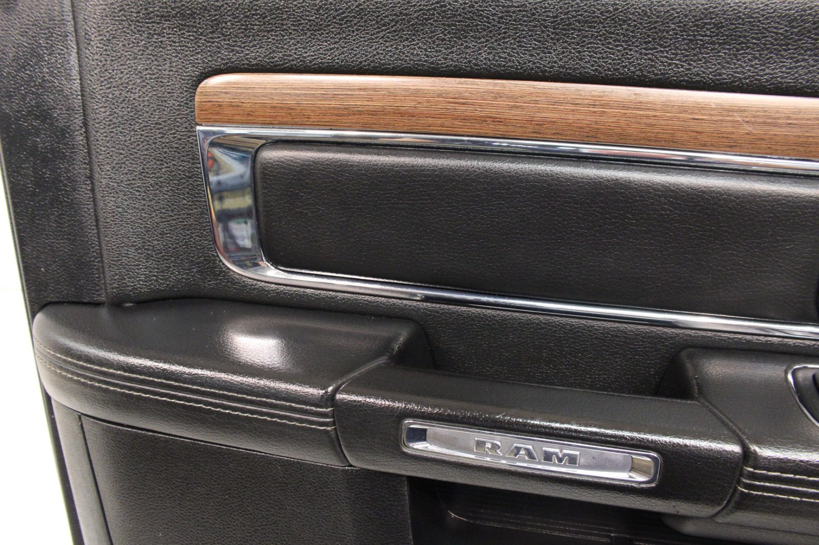 2013-2018 Ram Driver Front Door Panel, Laramie Crew Black Woodgrain 2190245-DX9